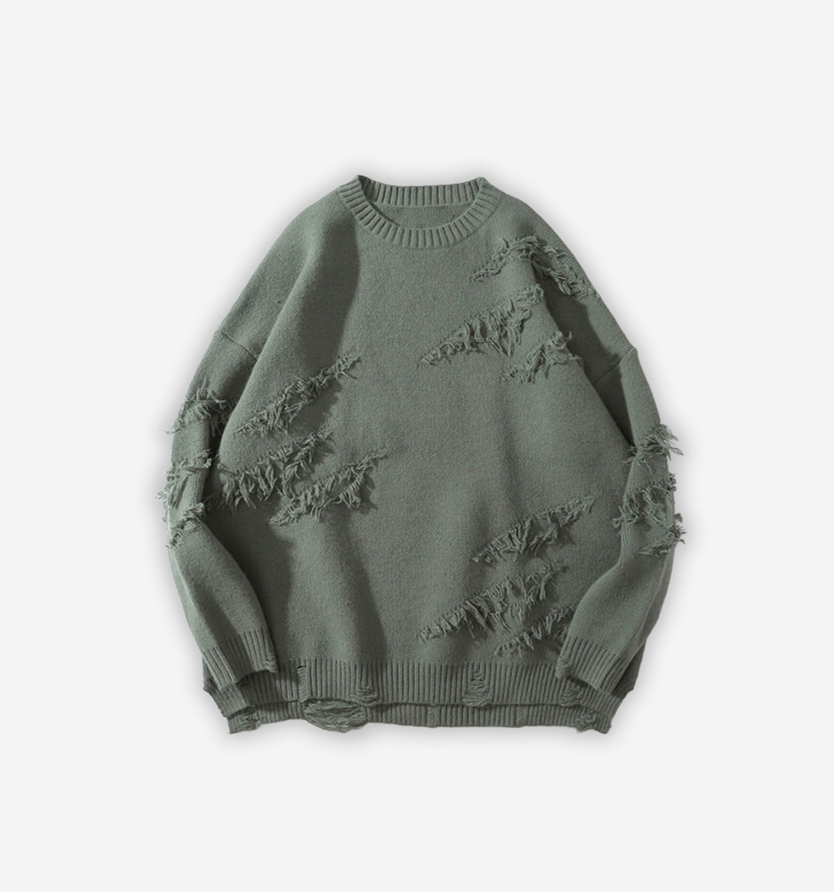 Black distressed sweater by 2KWRLD featuring a relaxed fit and ripped details, shown on a mannequin.