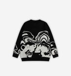 Black 2KWRLD DV Knit sweater displayed on a mannequin, showcasing its cozy knit texture and casual style.