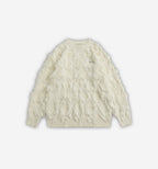 Black shaggy knit sweater by 2KWRLD featuring soft, textured yarn and a cozy fit, displayed on a plain background.