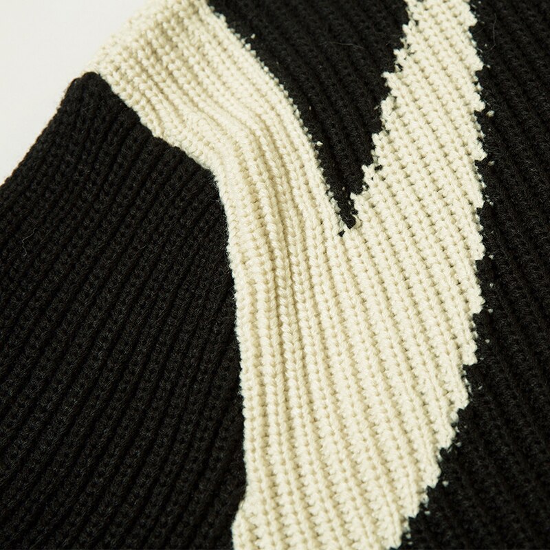 Black 2KWRLD cardigan jacket with a cozy, casual fit and button-up front, perfect for layering and everyday wear.