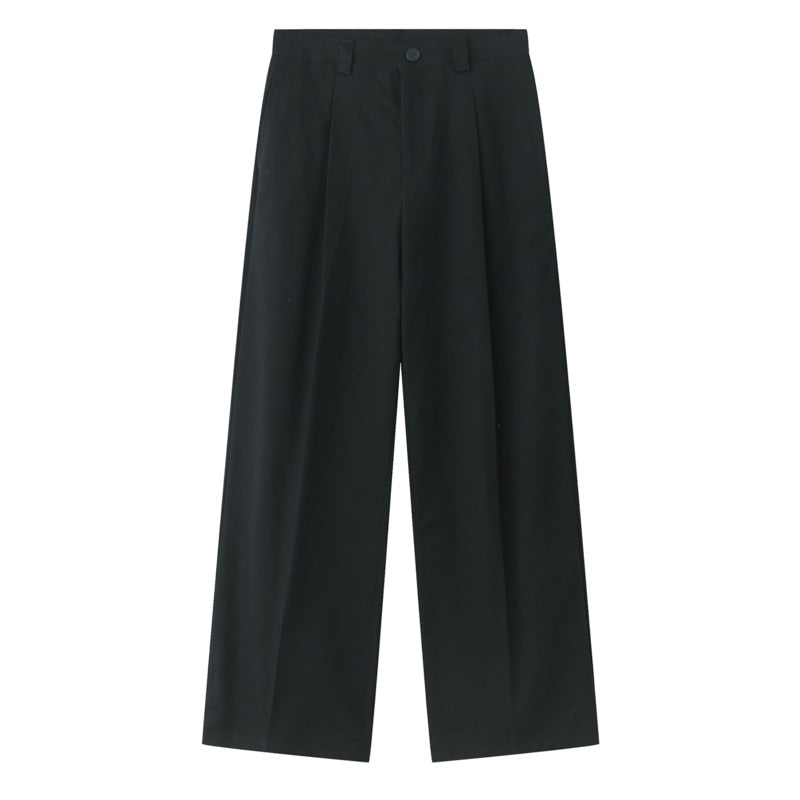 Black loose suit pants from 2KWRLD, featuring a relaxed fit and casual style, displayed on a plain background.