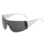 Black wrap glasses by 2KWRLD with sleek, curved design and dark tinted lenses, perfect for a modern, stylish look.