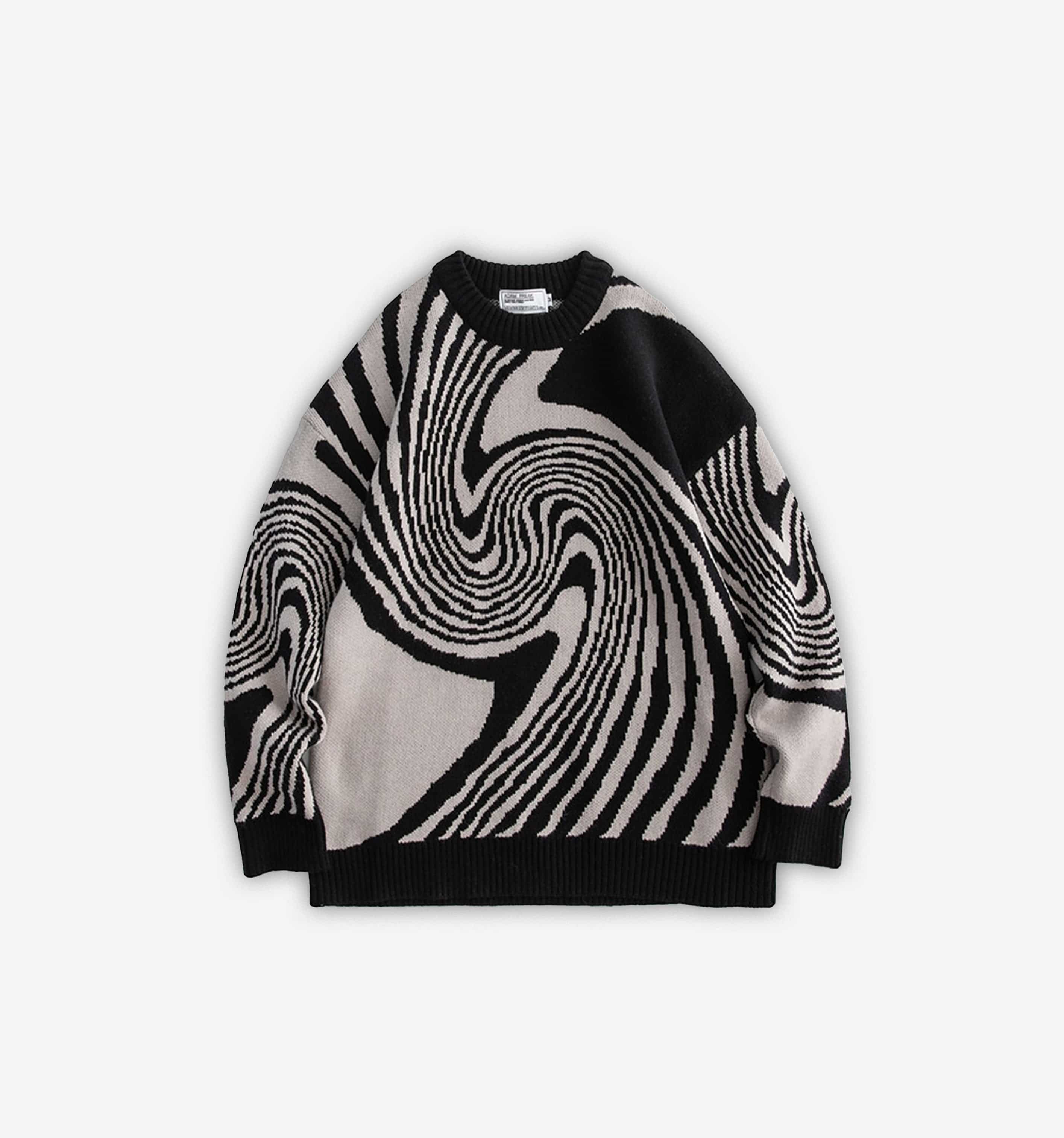 Blue Swirly Sweater by 2KWRLD, featuring a cozy knit design with swirling patterns, worn by a model.