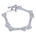 Bone bracelet by 2KWRLD featuring smooth, rounded bone beads strung on an elastic cord, stylish and lightweight accessory.