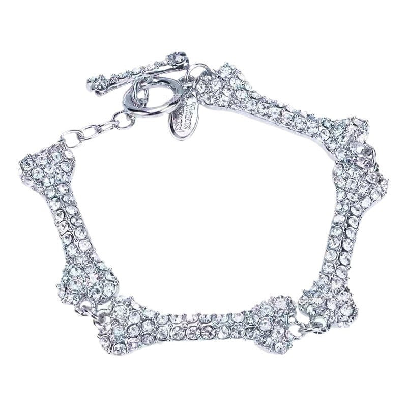 Bone bracelet from 2KWRLD featuring smooth, polished bone beads strung on an elastic cord for a stylish accessory.