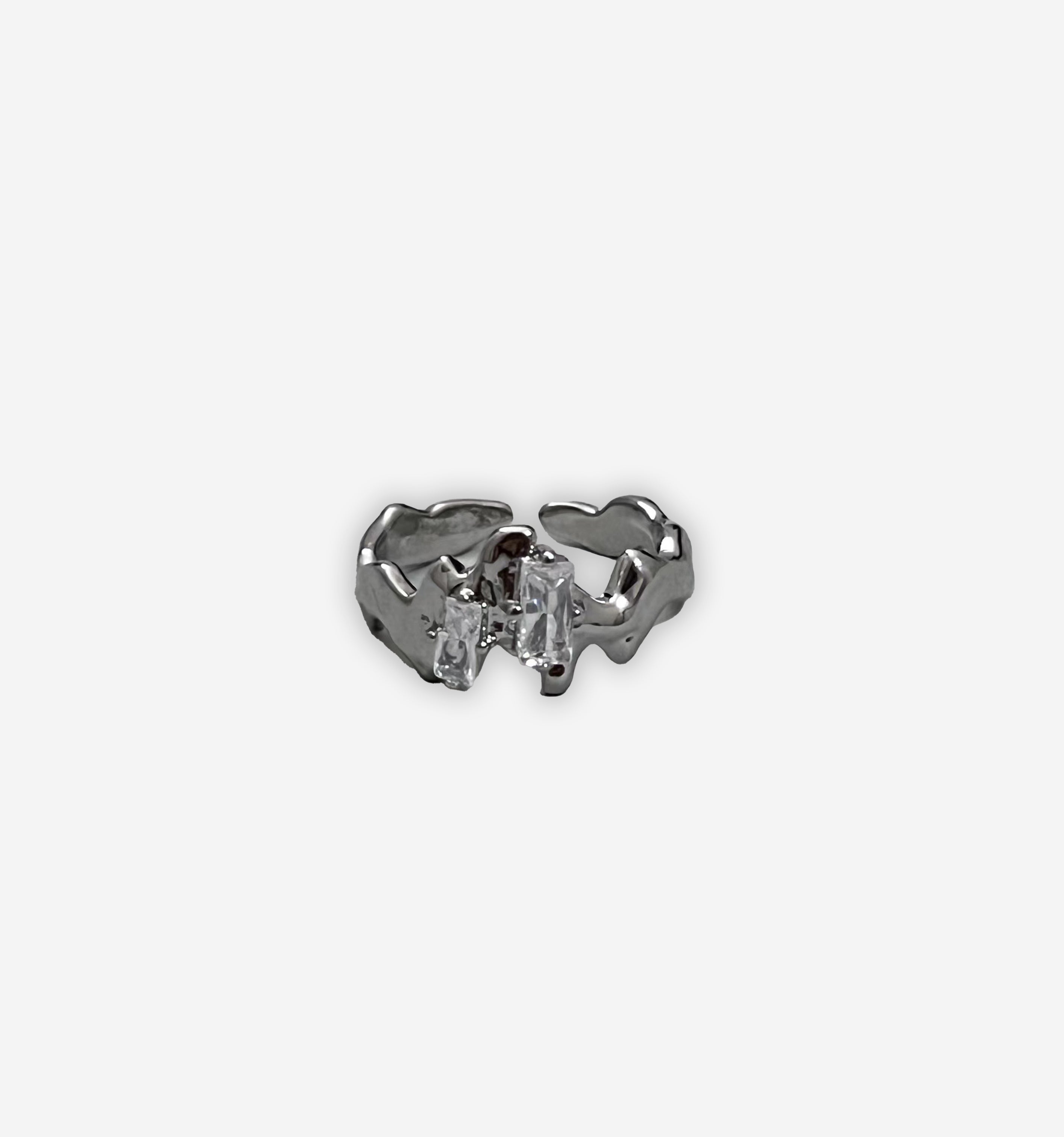 Two-tone dual stone ring by 2KWRLD featuring a sleek design with two sparkling stones set on a polished band.