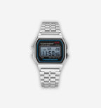 Digital electronic watch by 2KWRLD showing time on a sleek black strap and digital display.