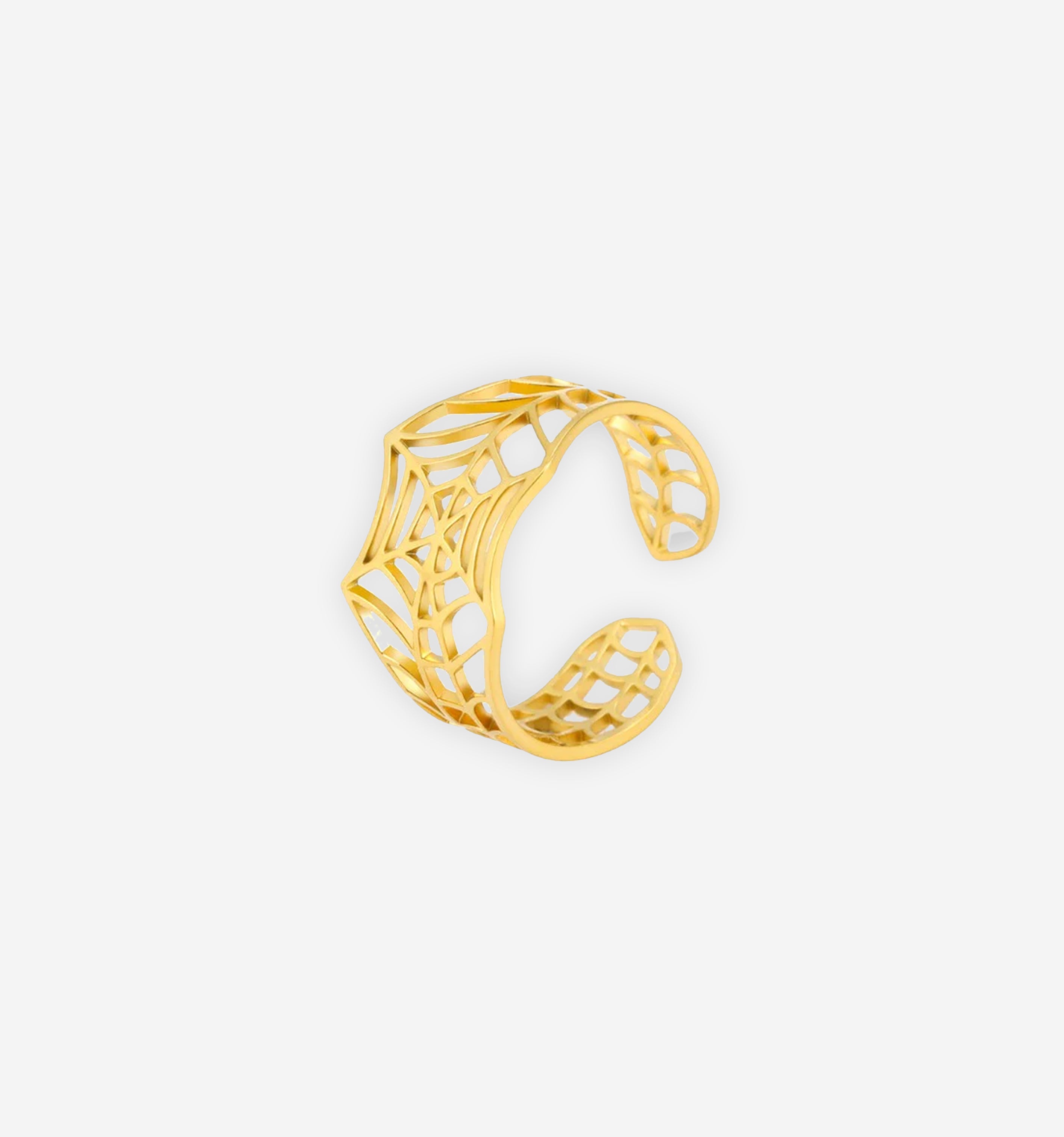 Gold Spiderweb Ring by 2KWRLD featuring a detailed web design in a sleek and elegant jewelry style.