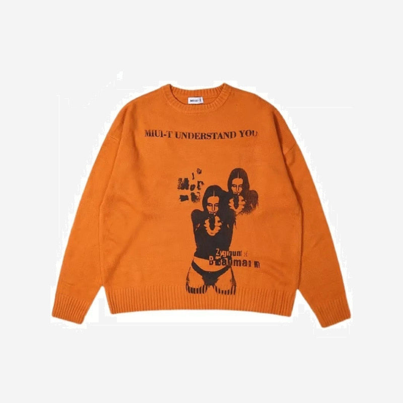 Gray Point N Shoot Knit by 2KWRLD featuring a cozy, fitted knit sweater with a round neckline and long sleeves.