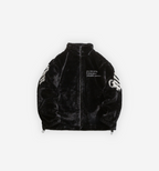Black fleece energy jacket by 2KWRLD featuring a high collar and zip-up front, ideal for outdoor warmth and comfort.
