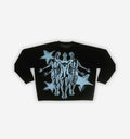 Close-up of a Stargazer Knit sweater by 2KWRLD, showcasing its textured fabric and stylish design.