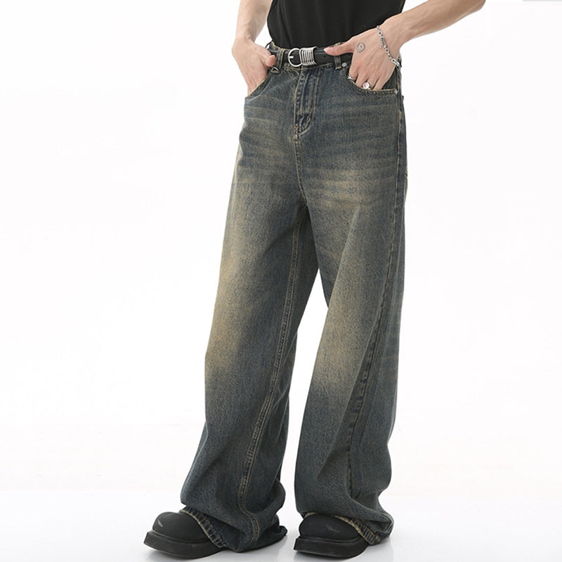 Loose Metro Mist denim jeans by 2KWRLD in a light blue wash, displayed on a hanger with a casual fit and relaxed style.