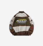 Blackaid Jacket in brown by 2KWRLD, featuring a sleek design with a front zipper and stylish collar.