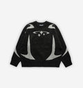 Black Orion Knit sweater from 2KWRLD, featuring a cozy, textured knit fabric and a classic crew neckline.
