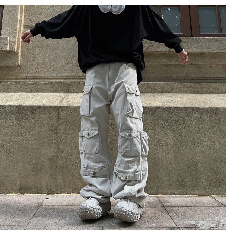 Men's ten pocket cargos by 2KWRLD featuring multiple functional pockets and a casual fit in neutral fabric.