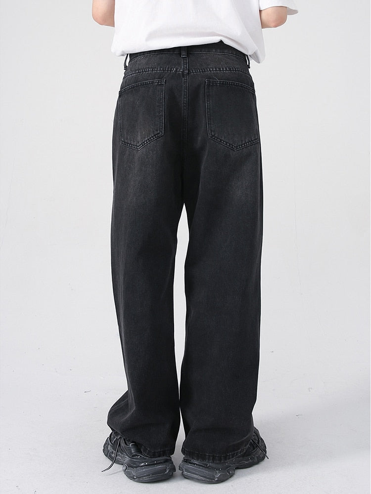 Pair of 2KWRLD Urban Eclipse straight denim jeans showing classic fit and dark wash fabric.