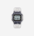 White digital watch by 2KWRLD showing time on a sleek, modern display with a digital interface.