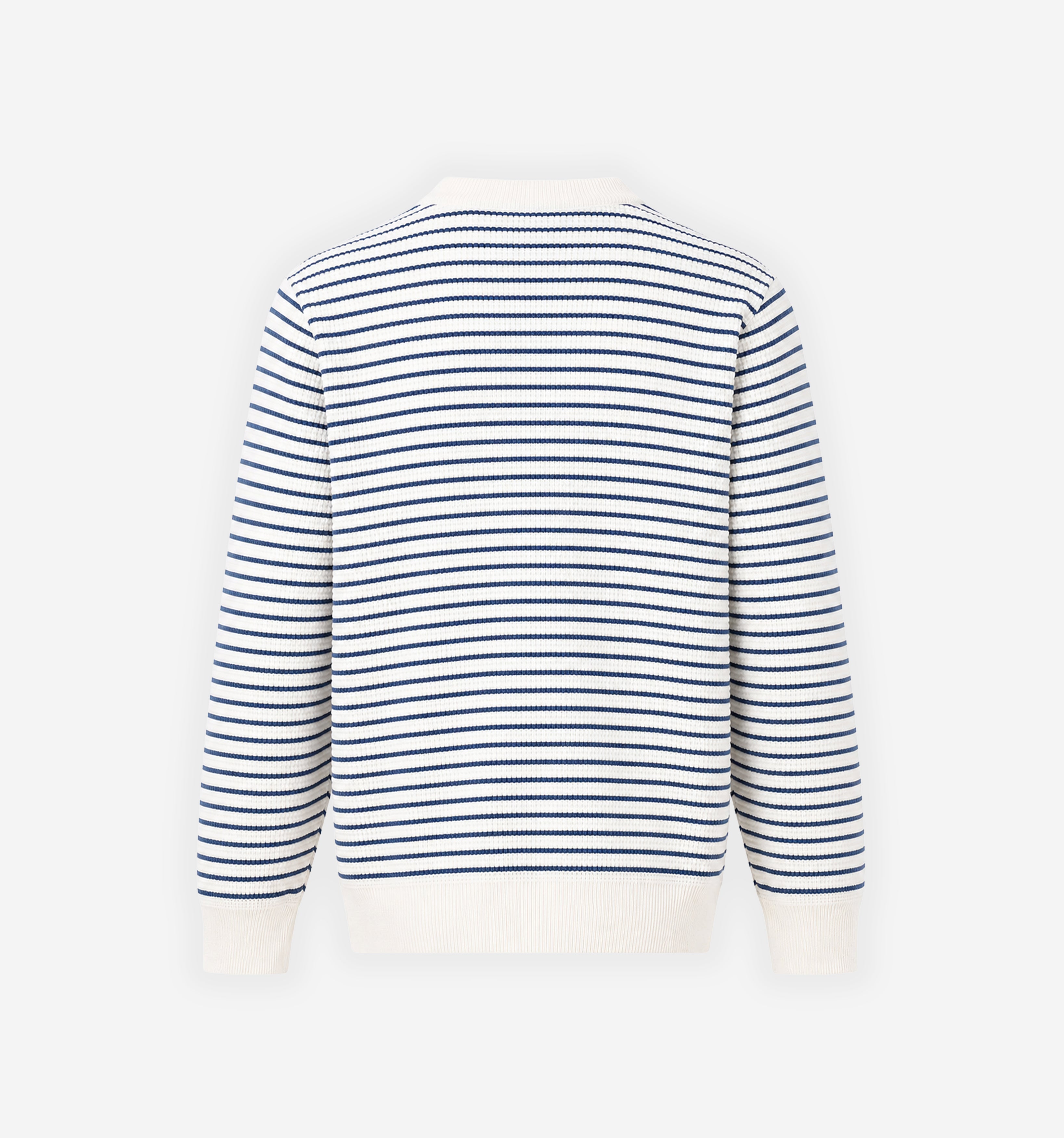 Striped waffle knit sweater by 2KWRLD featuring a cozy, textured design with horizontal stripes in various colors.
