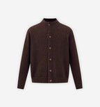 2KWRLD melange knit cardigan shown hanging, featuring a cozy, multicolored textured knit with a relaxed fit and open front design.