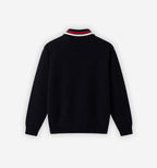 Blue knitted pullover by 2KWRLD featuring a cozy, textured knit pattern and a round neckline.