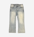 Light blue painted denim jeans from 2KWRLD, showing detailed brushstroke designs on the front and back.