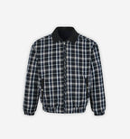 Reversible plaid and solid black Grid jacket by 2KWRLD, showing the front view with a grid pattern in the image.