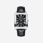 Black wristwatch with silver case and black leather strap on a white background