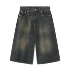 Black and grey Renegade Jorts by 2KWRLD featuring distressed denim and frayed hems, stylish casual shorts for men.