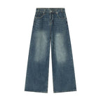 Black and grey Stellar Shadow denim jeans by 2KWRLD, showcasing a stylish slim fit design with subtle shadow pattern.