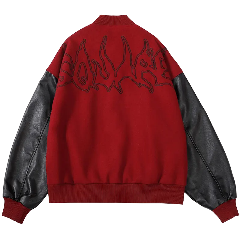 Black 2KWRLD varsity jacket with white stripe accents, ribbed cuffs, and a classic letterman style, shown on a hanger.