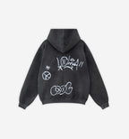 Black graffiti zip-up jacket by 2KWRLD featuring bold urban graffiti artwork and a stylish zip-front design.