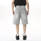 Blue Resist Jorts by 2KWRLD featuring distressed denim, high-rise fit, and rolled hems for a casual, trendy look.