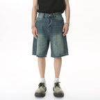 Blue Resist Jorts by 2KWRLD featuring a casual fit, distressed denim, and classic jean styling for a laid-back look.