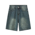 Blue Resist Jorts by 2KWRLD featuring distressed denim and frayed hems, styled as casual cut-off shorts for a relaxed look.