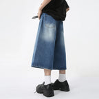 Blue Rebel Jorts by 2KWRLD featuring distressed denim, high-rise fit, and rolled hems for a casual, trendy look.