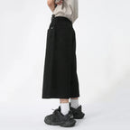 Blue Rebel Jorts by 2KWRLD featuring distressed denim shorts with frayed hems and a casual style.