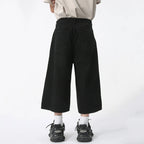 Blue Rebel Jorts by 2KWRLD, casual denim shorts with a distressed finish, featuring frayed hems and a relaxed fit.