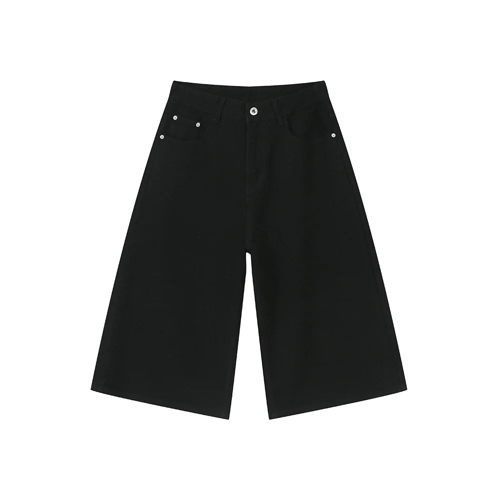 Blue Rebel Jorts by 2KWRLD featuring distressed denim shorts with frayed hems and a relaxed fit.