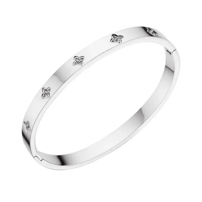 Silver Jace stamped bracelet by 2KWRLD featuring engraved design and adjustable chain on a neutral background.