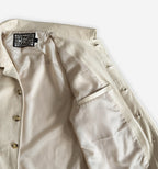 Inside view of the 2K WRLD suede jacket V2 showing the inner pocket and soft suede material.