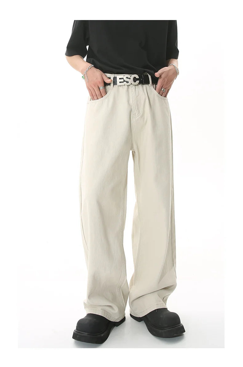 Khaki Stellar Light Denim jeans by 2KWRLD displayed in a close-up image highlighting fabric texture and stitching details.