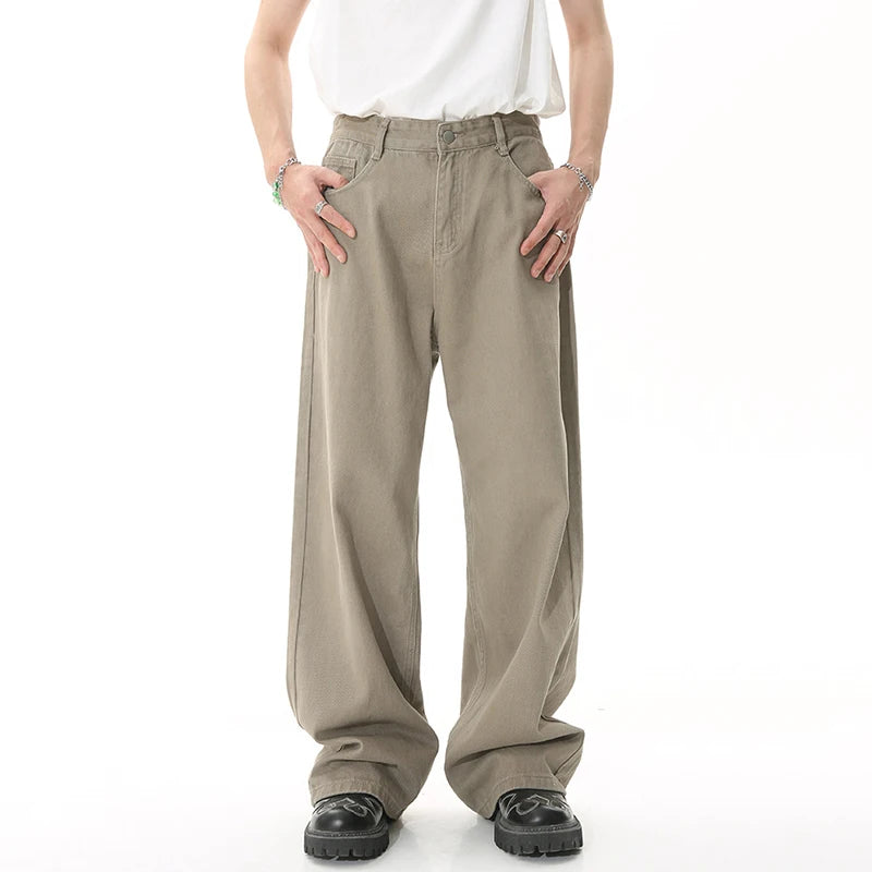 Khaki Stellar Light Denim jeans by 2KWRLD with a relaxed fit and subtle distressed details.