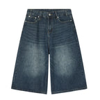Light blue Revolt Jorts by 2KWRLD, showcasing distressed denim shorts with frayed hems and stylish fit.