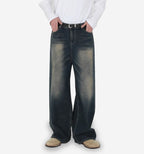 Pair of 2KWRLD Azure Denim jeans showing the front view with classic five-pocket design and light blue wash.