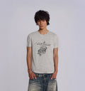 Model wearing 2KWRLD Rodeo T-Shirt made from 200GSM fabric, featuring a casual fit and graphic design on the front.
