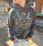 Coming Soon 2KWRLD hoodie displayed on a model, showcasing the front design and comfortable fit.