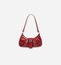 Red Nirvan shoulder bag by 2KWRLD featuring a sleek design, adjustable strap, and spacious interior for everyday use.