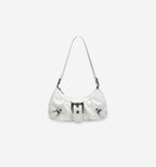 Red Nirvan shoulder bag by 2KWRLD featuring a sleek design with a shoulder strap and stylish accents.