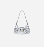 Red Nirvan shoulder bag by 2KWRLD featuring a sleek design with a shoulder strap and stylish hardware.