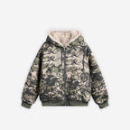 Cropped camo canvas jacket by 2KWRLD featuring a military-style print and adjustable waist on a hanger.